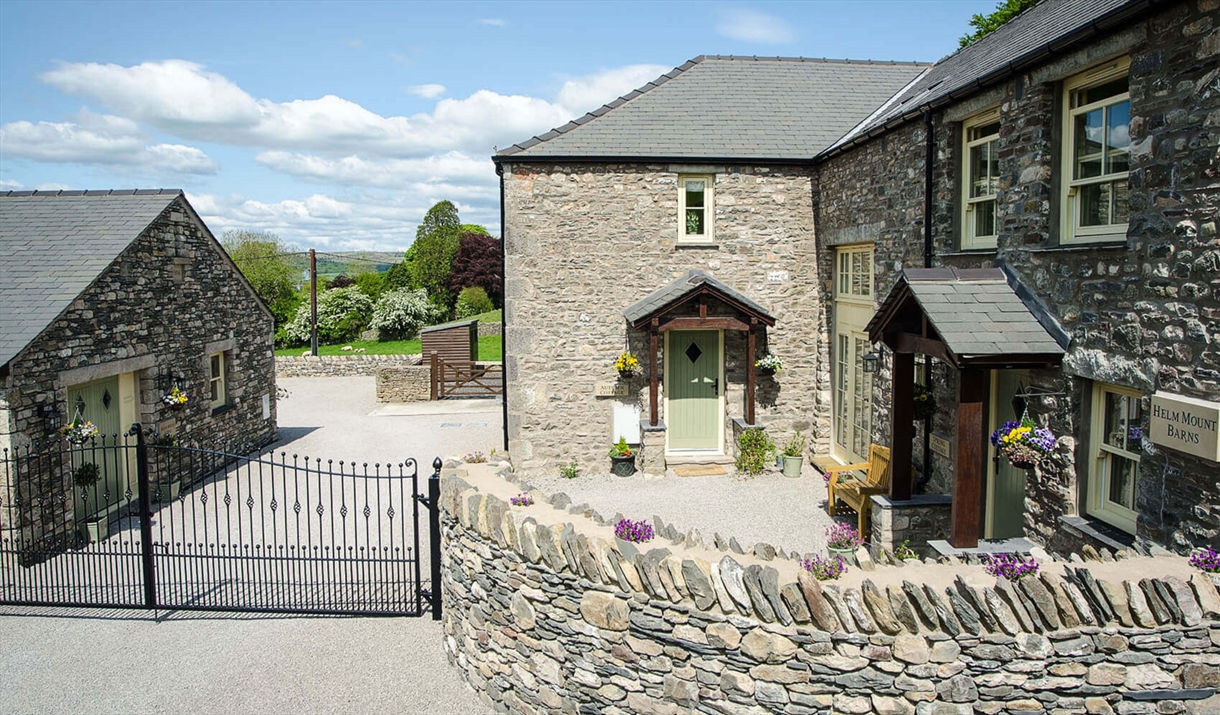 Exterior and Entrance to Autumn Cottage at Helm Mount Cottages in Barrows Green, Cumbria