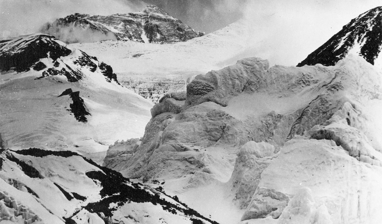 Black and white photo of snowy mountain peaks