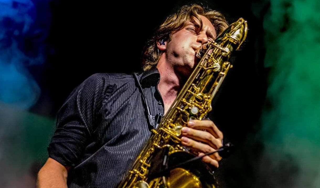 A member of the Jack Pearce Quartet playing Saxophone on stage
