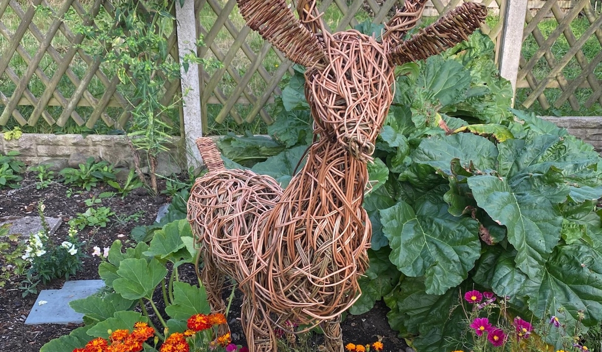 Willow deer in a garden