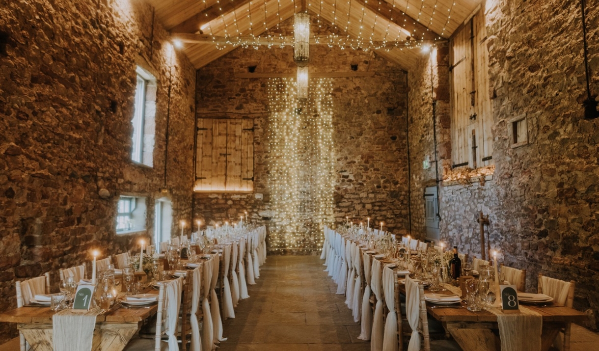 Interior of Eden Barn, set for a wedding breakfast in Kirkby Stephen, Cumbria