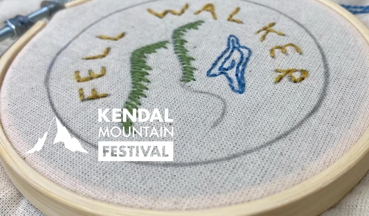 embroidered patch on a fabric within an embroidery hoop