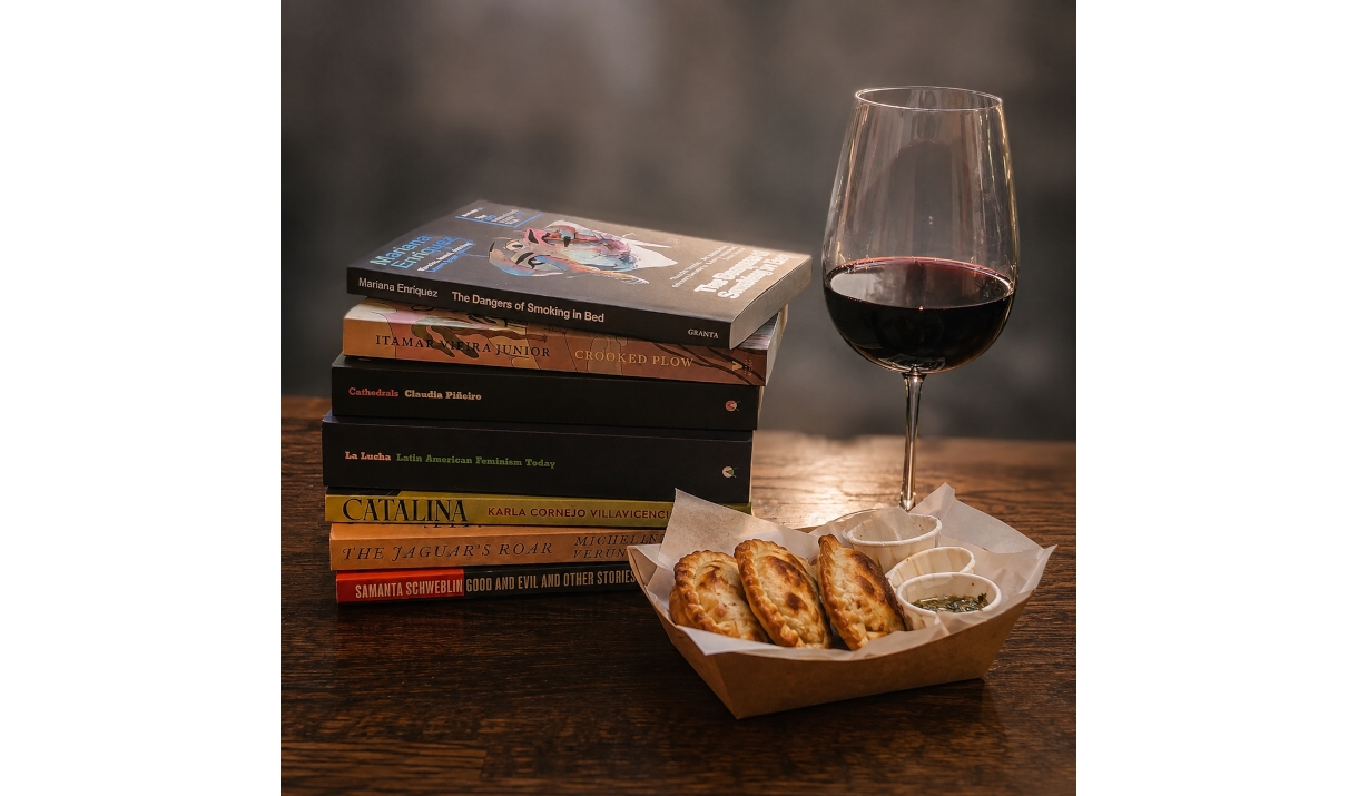 Collection of Latin American Books, Wine, and Empanadas