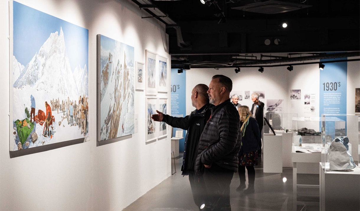 Visitors viewing artwork at the Everest Revisited Exhibition at Rheged in Penrith, Cumbria