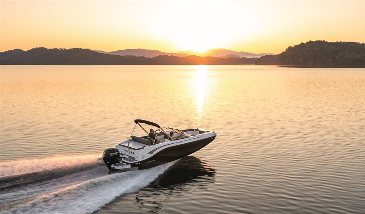 Boat on a Lake at Sunset, from Freedom Boat Club Windermere in Bowness-on-Windermere, Lake District