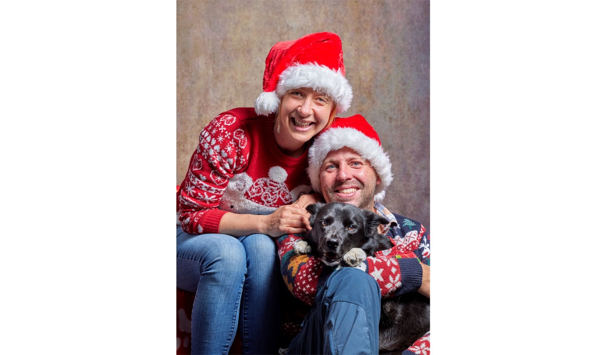 Couple and Dog at the Santa Paws Festive Photo Studio at Fell Foot, Lake District
