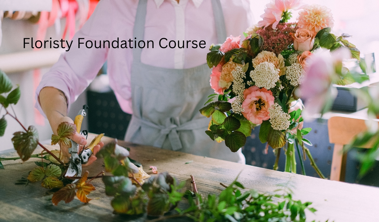 Florist making a colourful bouquet, with the words "Floristry Foundation Course"