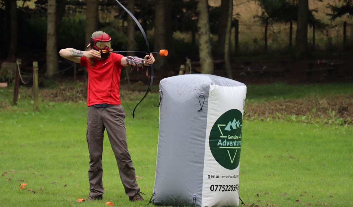 Visitor Playing Archery Tag with Genuine Adventures in the Lake District, Cumbria