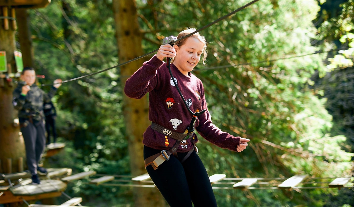 Family on a Treetop Challenge at Go Ape in Whinlatter Forest Park in Braithwaite, Lake District