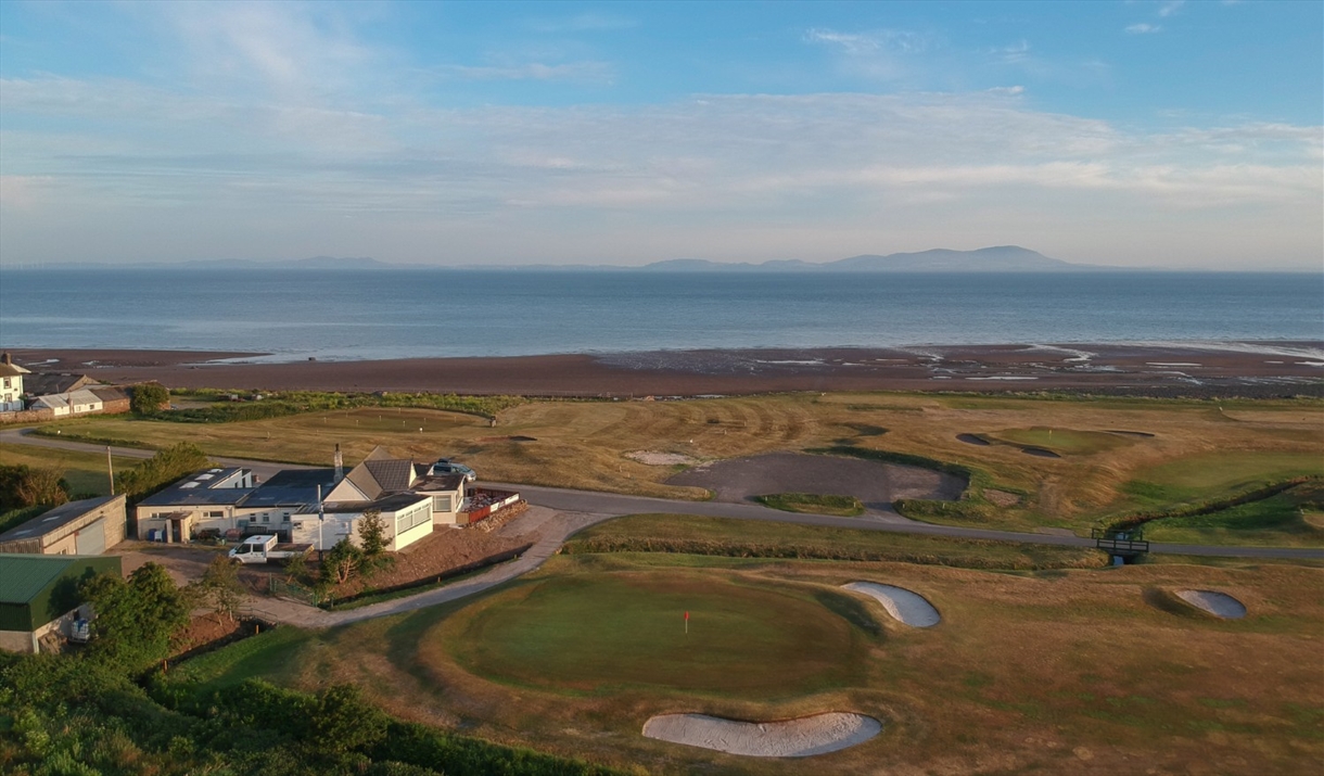 Hole 18 green and Clubhouse at Maryport Golf Club in Maryport, Cumbria