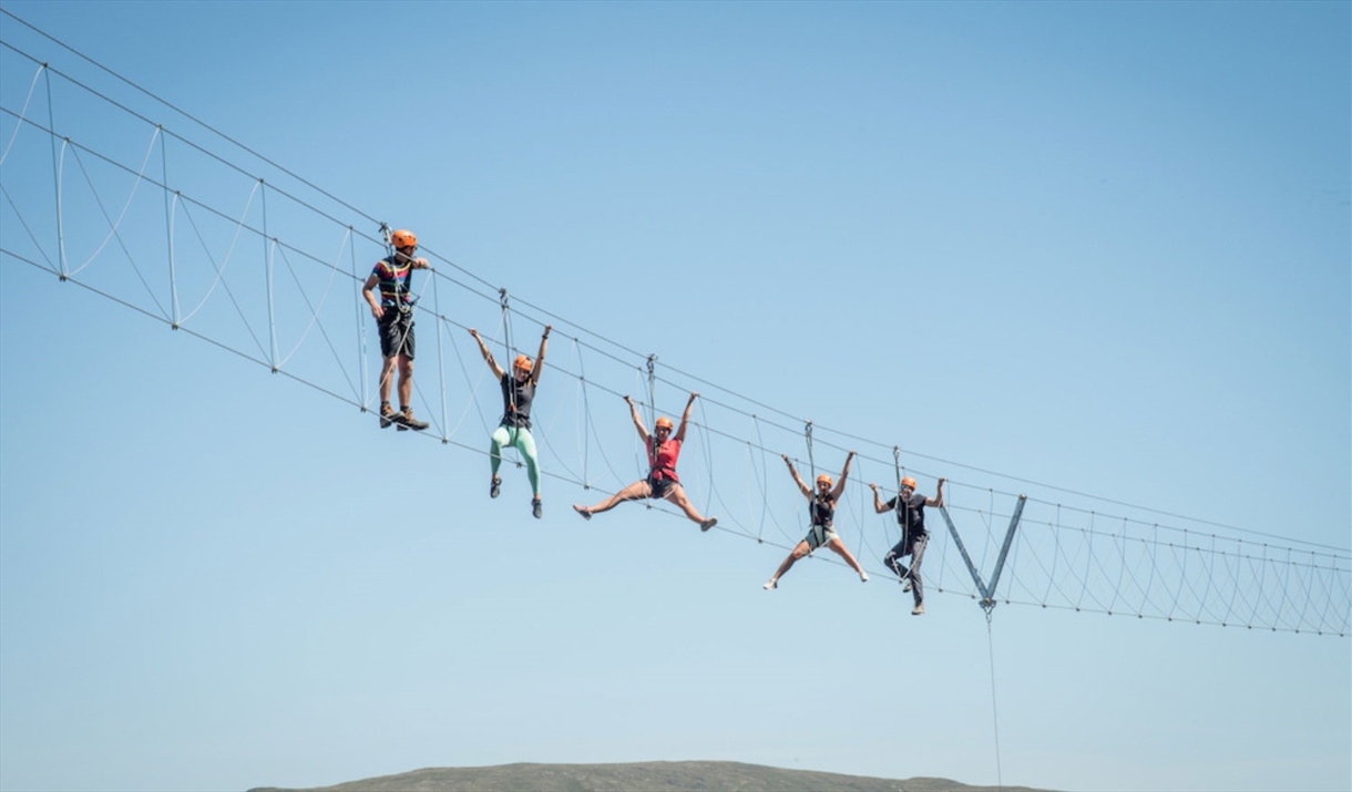 Visitors on the Infinity Bridge at Honister Slate Mine in Borrowdale, Lake District