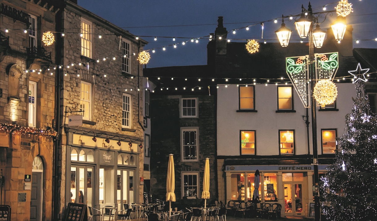 Photo of Kendal town centre lit up with Christmas lights