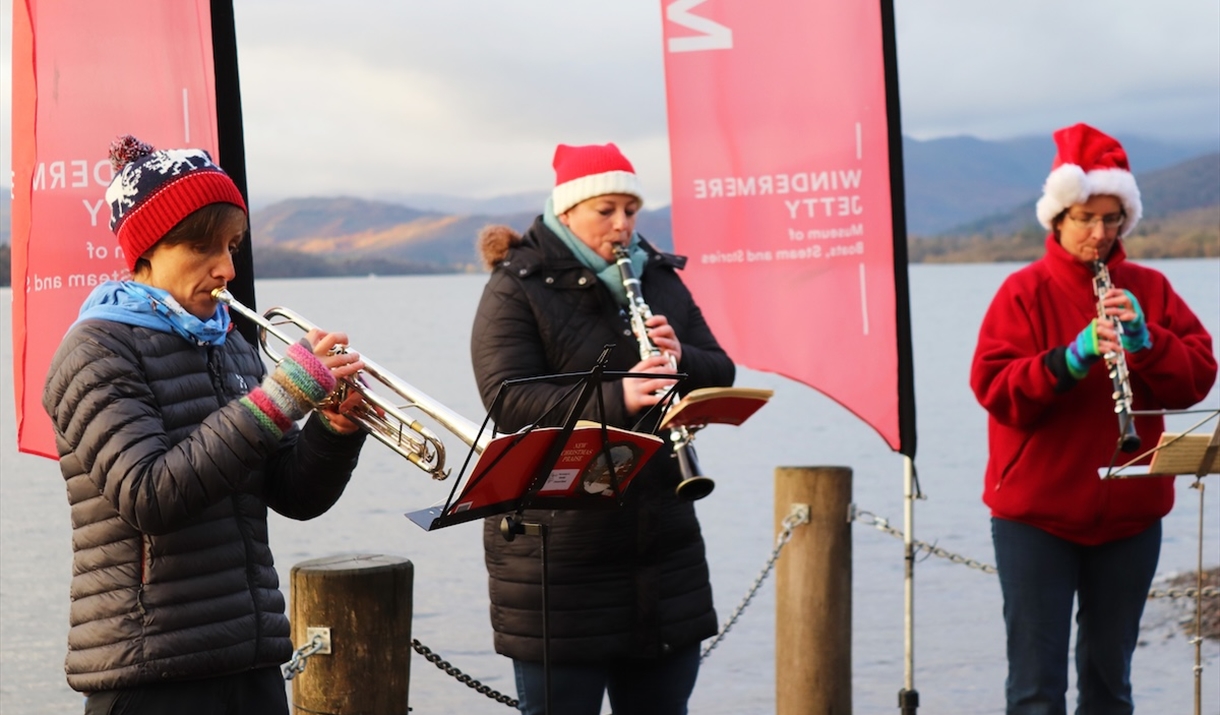 Kendal Concert Band performing by the lake
