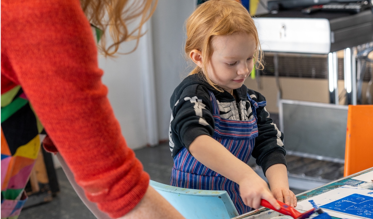 Photo of a child crafting in a classroom