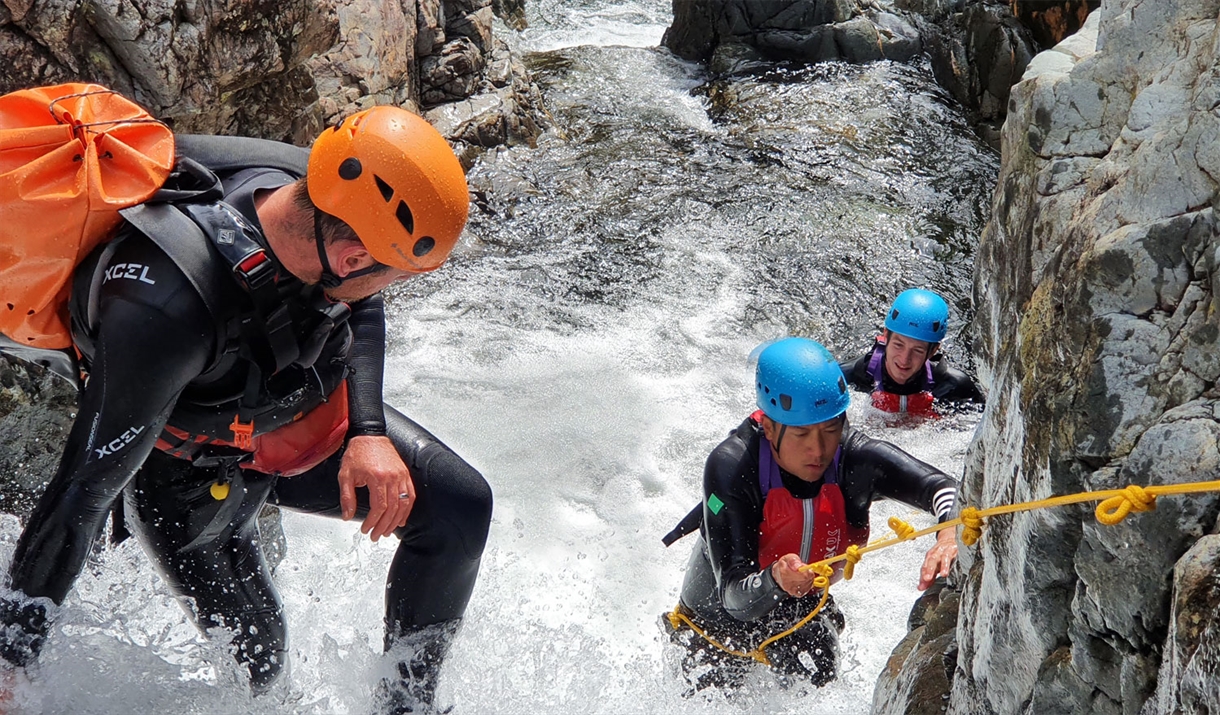 Visitors Extreme Ghyll Scrambling and Canyoning with Path to Adventure in Eskdale, Lake District