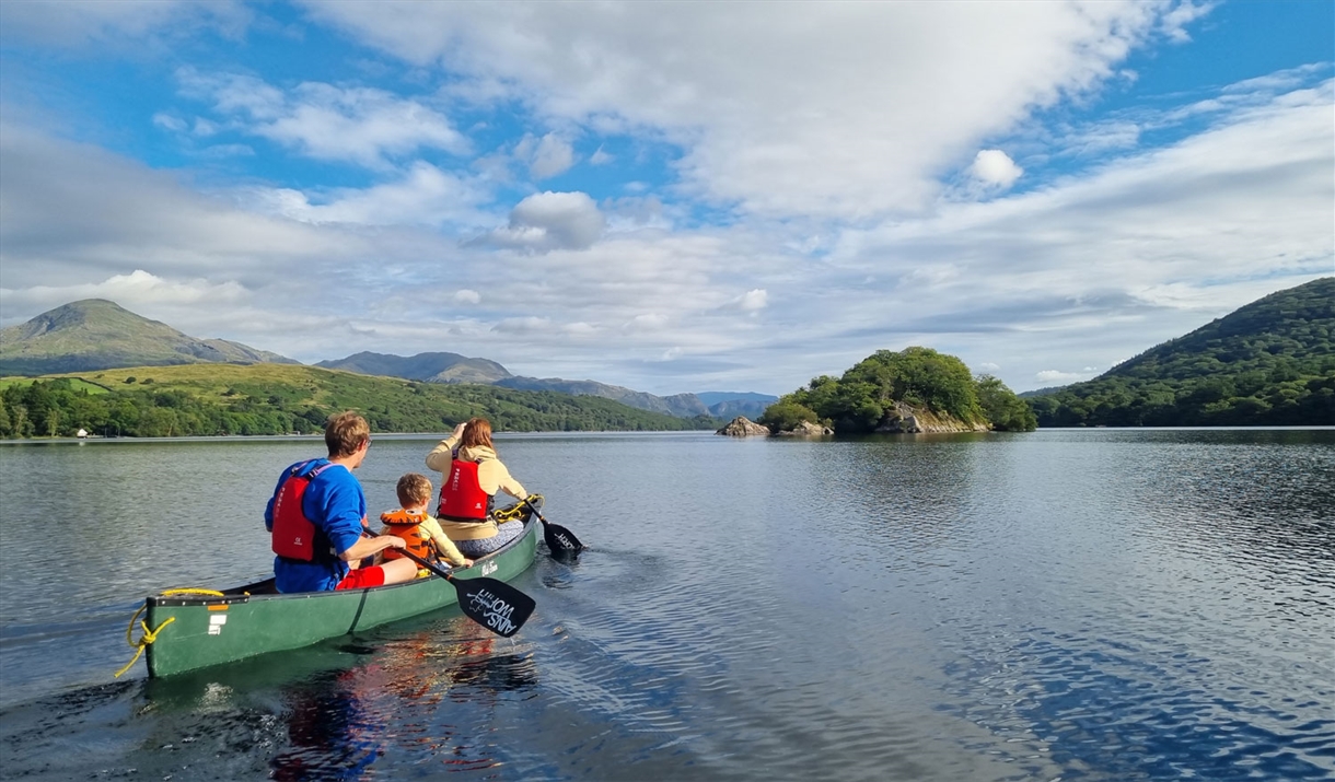 Visitors on a Guided Canoe Trip with Path to Adventure in Coniston, Lake District