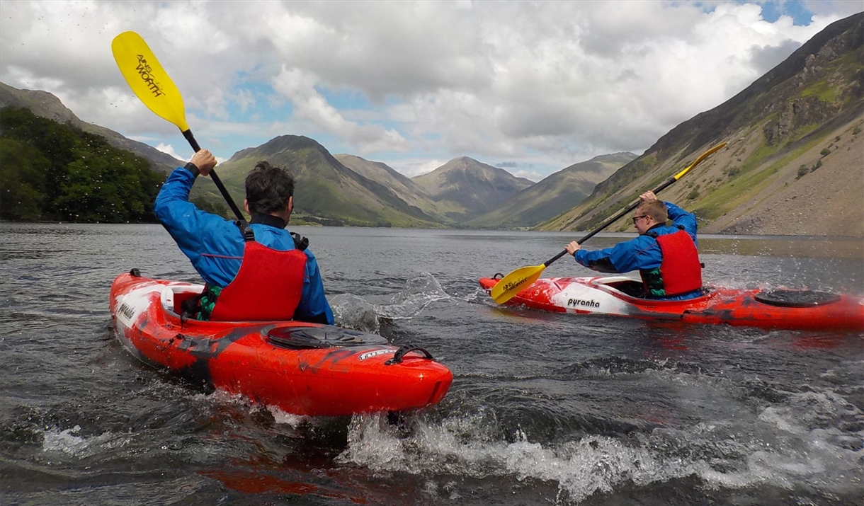 Visitors Kayaking in the Lake District with Path to Adventure