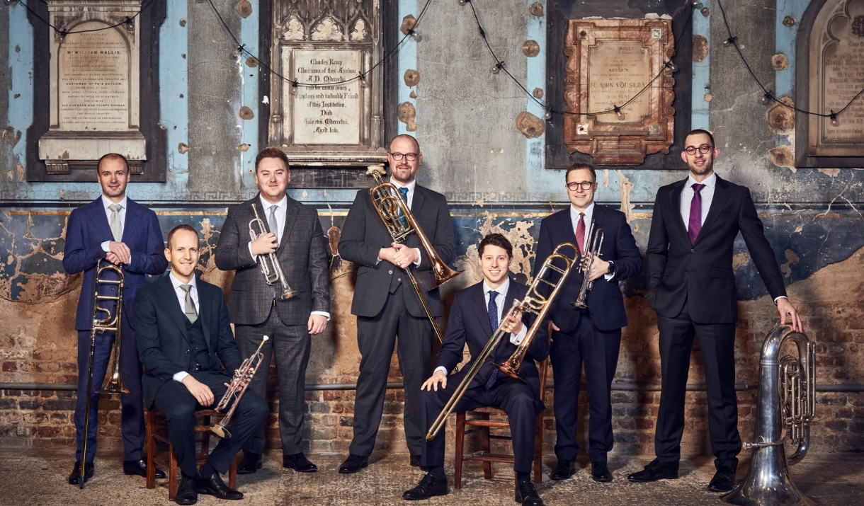 Septura Brass stood in suits with their instruments