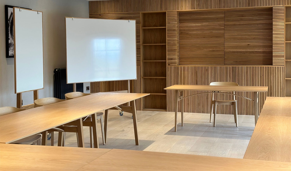 Meeting room layout with whiteboards at The Hub at The Heaning Estate in Windermere, Lake District