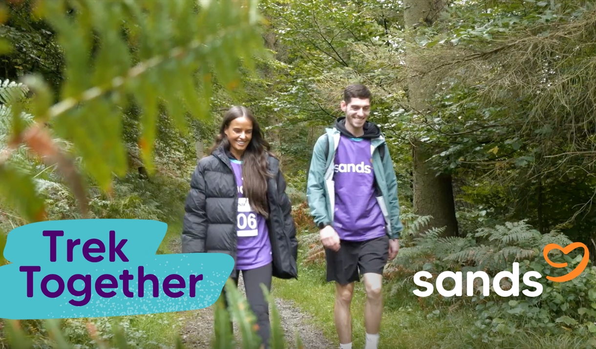 2 people walking Trek Together 2025