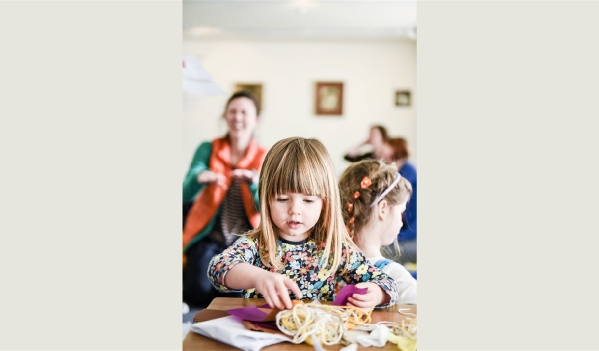 A child doing some arts and crafts