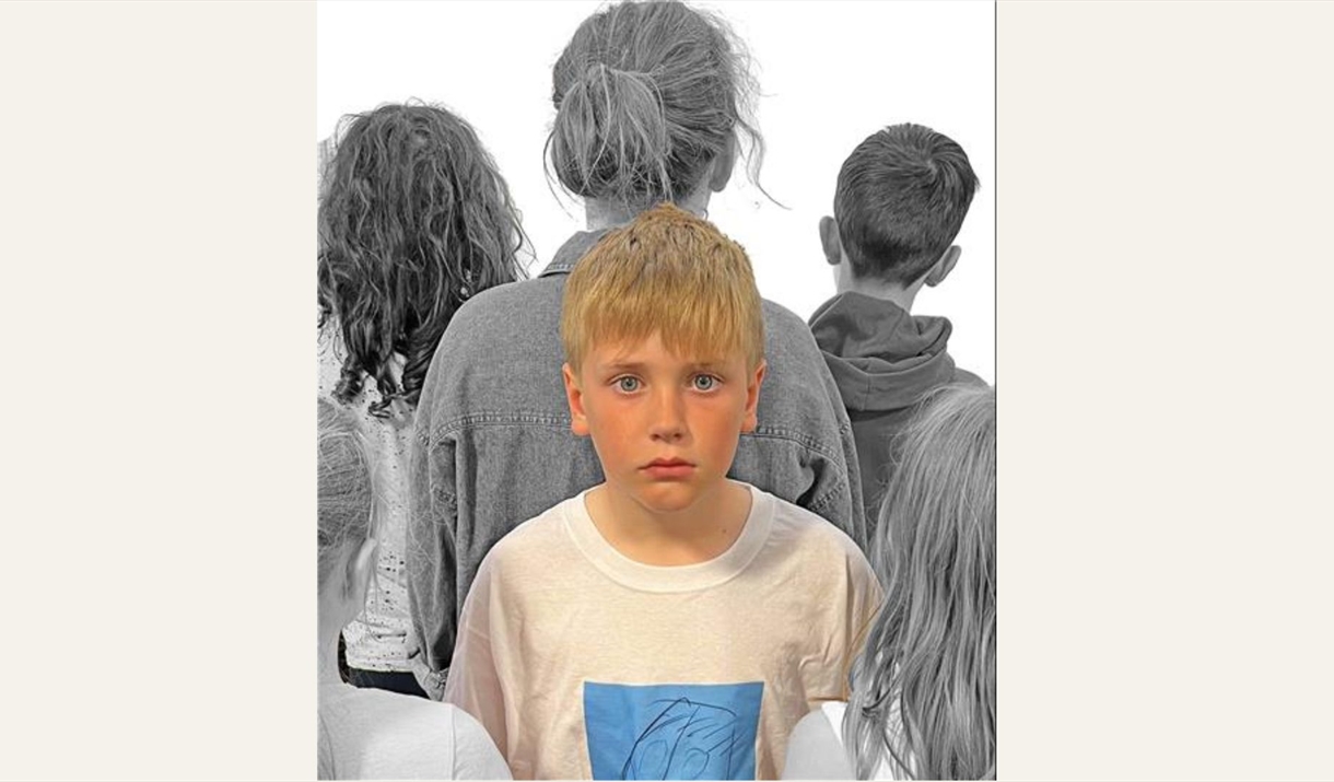 A child looks lonely among a group of other children