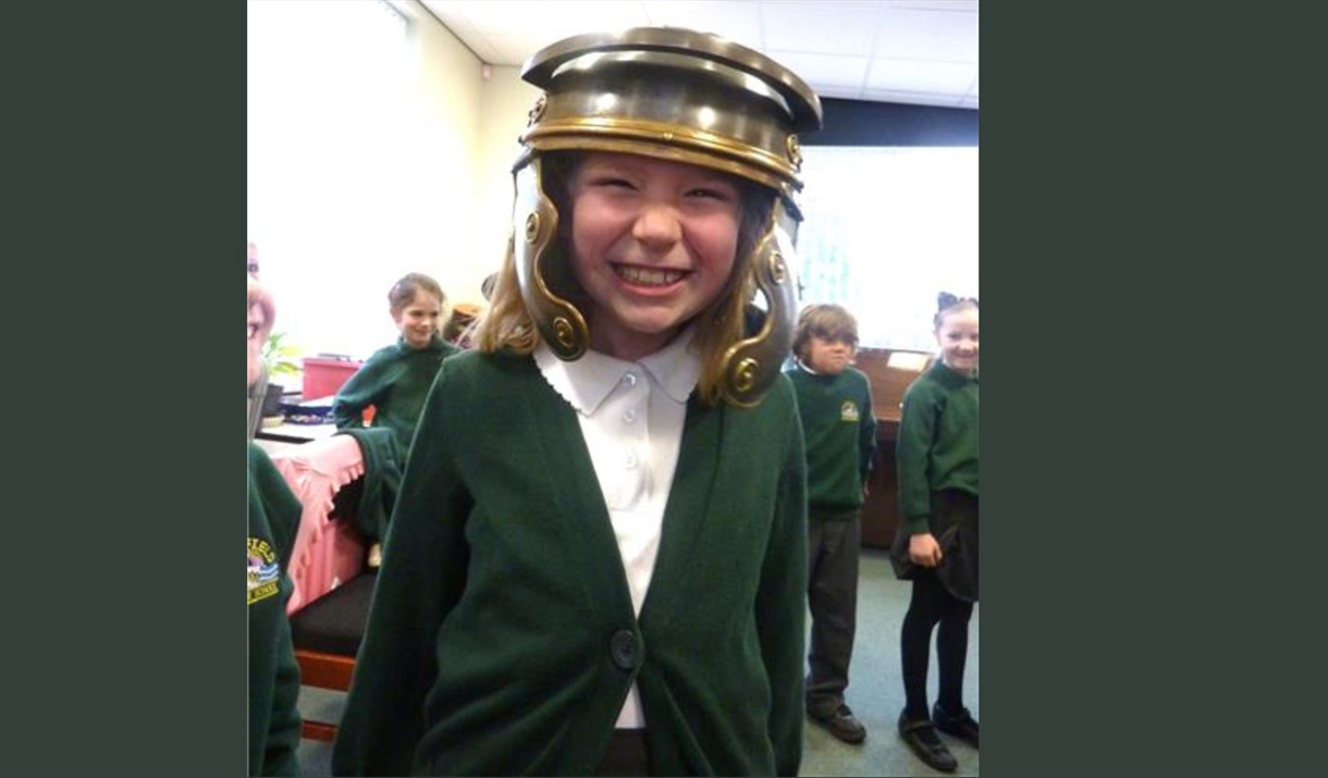 Girl in Roman helmet