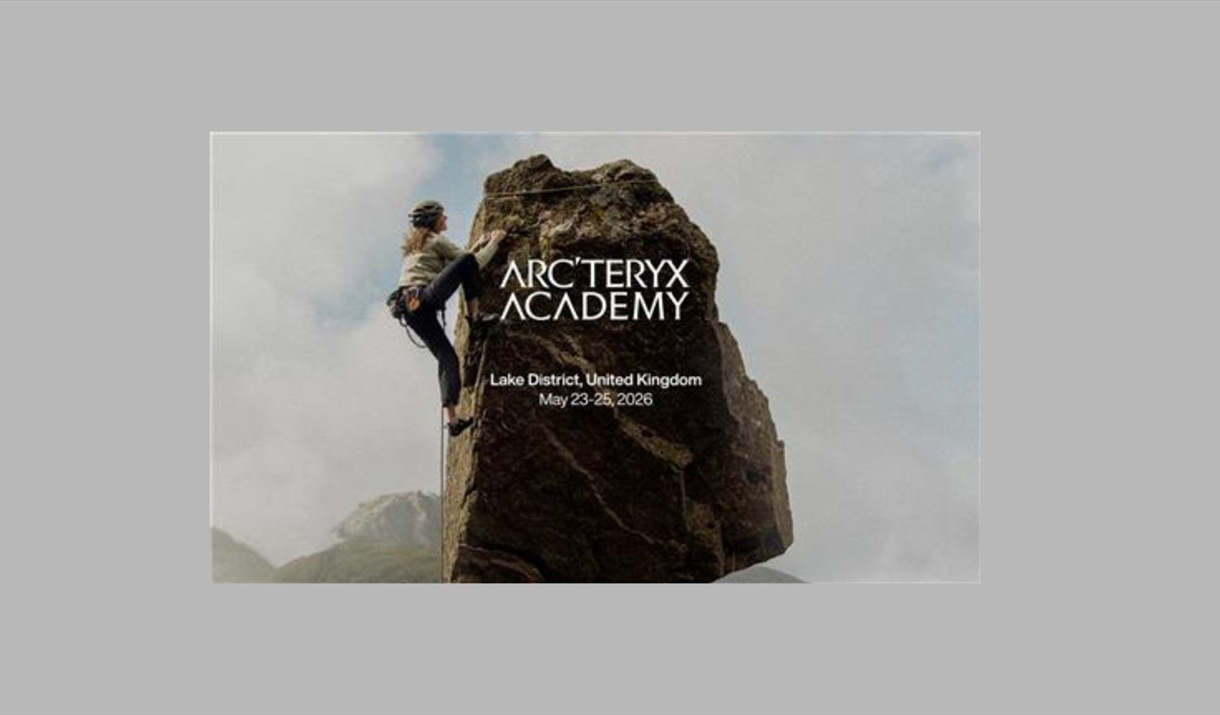 image of climber on a rock