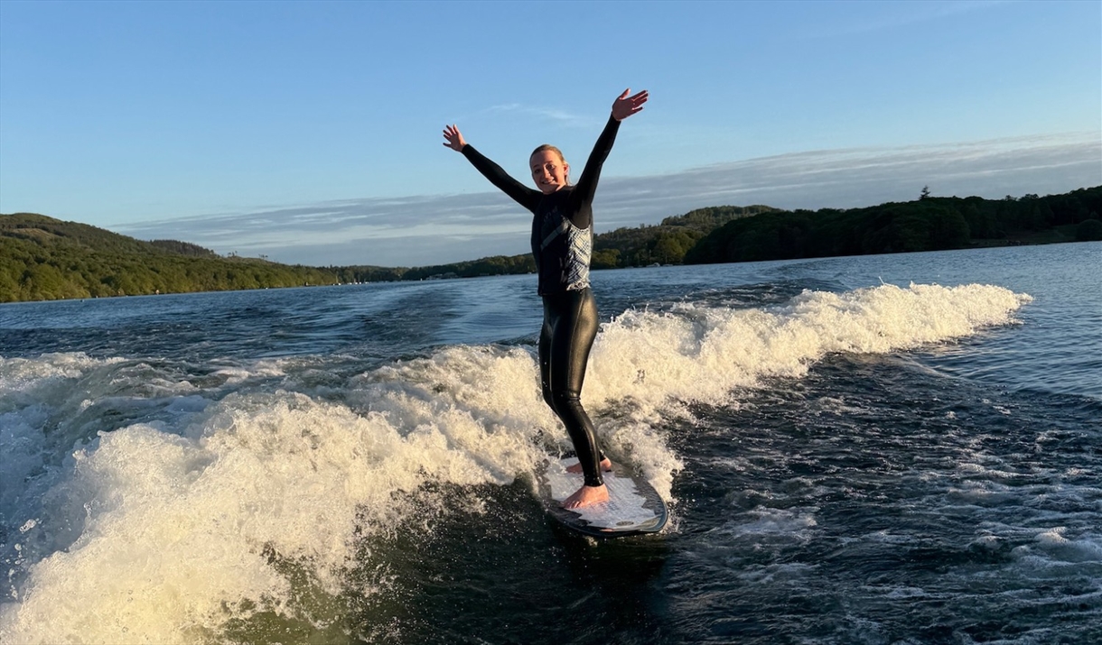 Visitor on a wakeboarding experience with Wake District on Lake Windermere in the Lake District, Cumbria