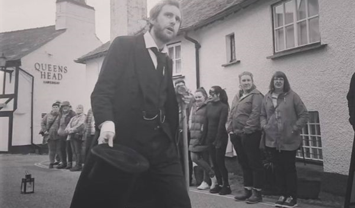 person walking in old fashioned clothes