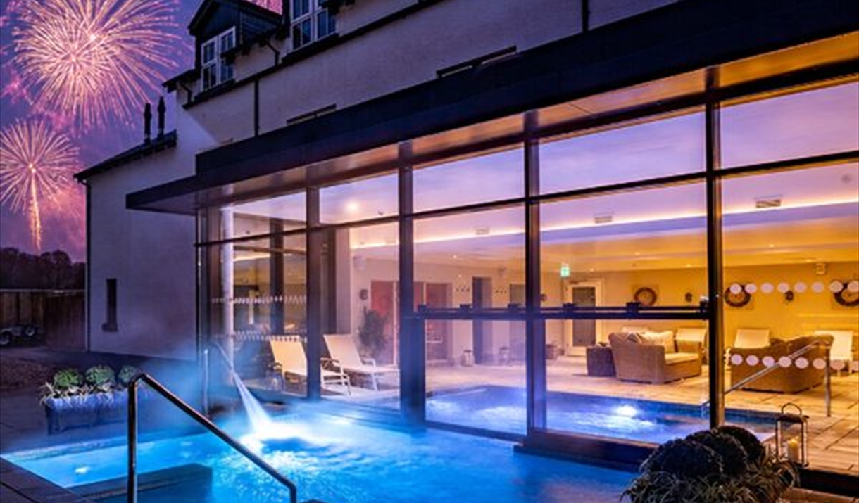 Outside spa pool showing fireworks in the background
