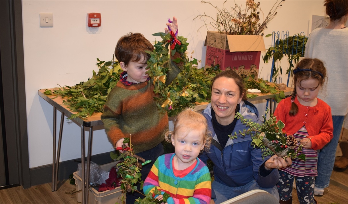 Family making Christmas decorations