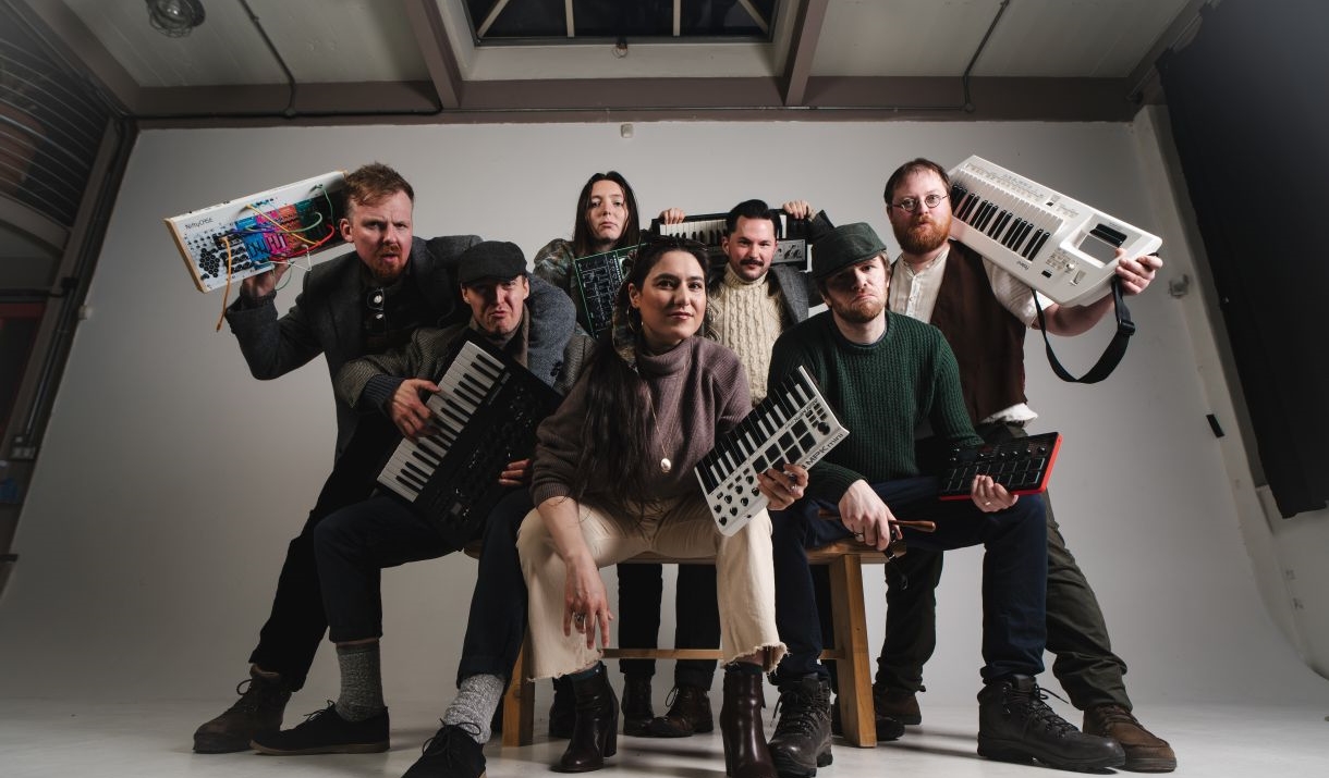 7 members of Scottish folk band Yoko Pwno show off their not-so-traditional instruments