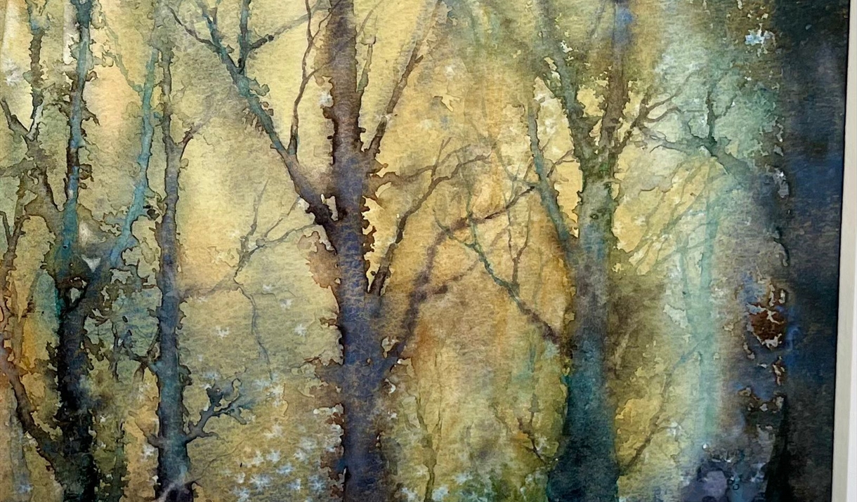 Watercolor painting depicting a serene forest scene with various trees and soft, blended colors.