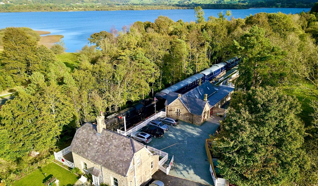 Aerial Photo of Bassenthwaite Lake Station & Carriage Cafe, with Bassenthwaite Lake in the Background, in the Lake District, Cumbria