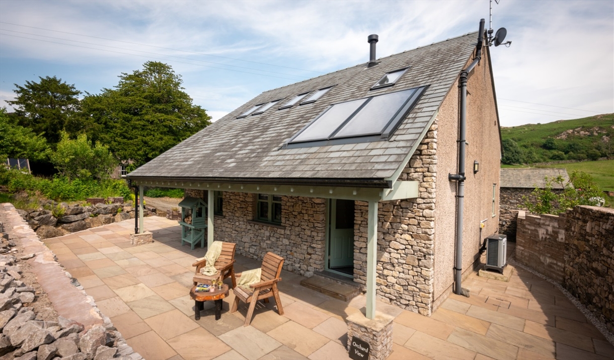 Exterior and patio seating at Ellenboro House in Newton-in-Cartmel, Lake District