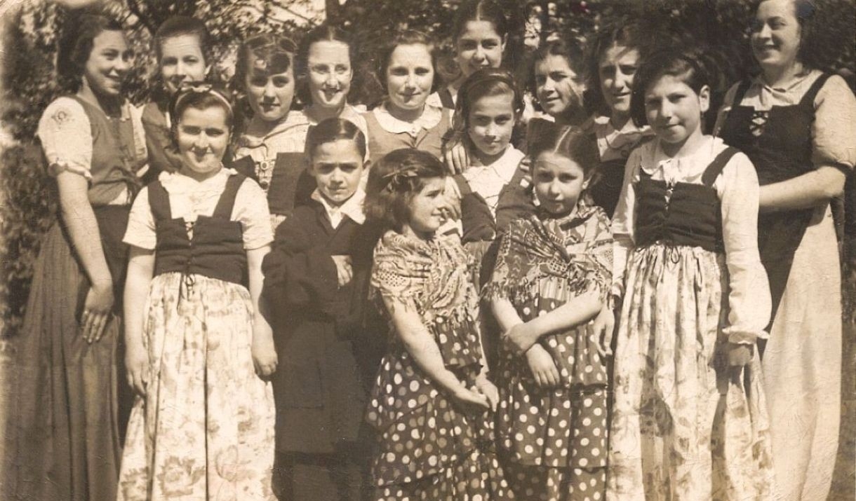Refugee children in dance costumes gathered at Brampton.