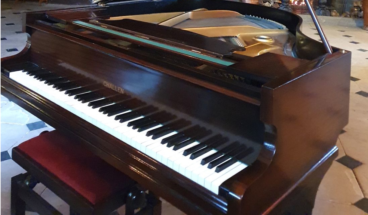 Grand piano in Muncaster Castle