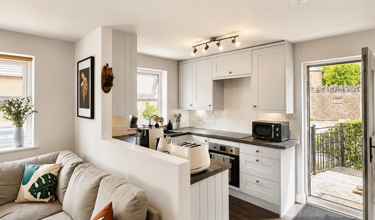 Kitchen and living room in Scarpa from Muddy Boots Escapes in Kirkby Stephen, Cumbria