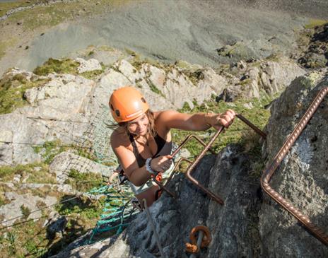 Climber at Via Ferrata Xtreme at Honister Slate Mine in Borrowdale, Lake District