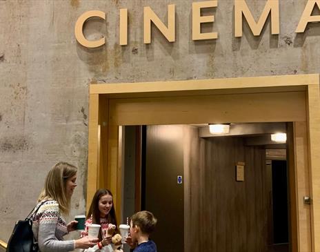 Visitors at the Cinema Entrance at Rheged in Penrith, Cumbria