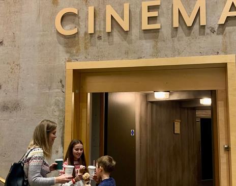 Visitors at the Cinema Entrance at Rheged in Penrith, Cumbria