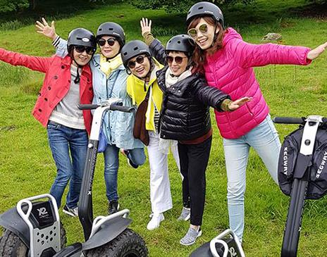 Visitors enjoying an experience with Lakeland Segway in Cartmel, Lake District