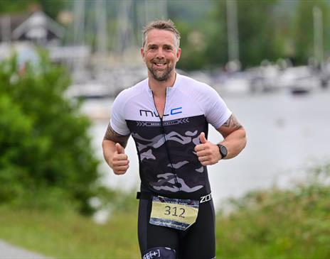 Triathlon running alongside Windermere