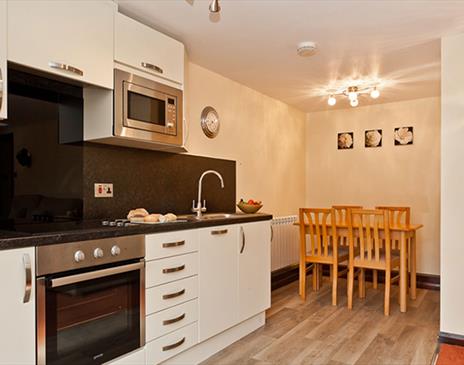 Kitchen and Dining Area in a Self Catered Unit at Burnside Park in Bowness-on-Windermere, Lake District