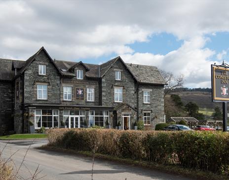 Exterior and signage at The Coniston Inn, Coniston, Lake District