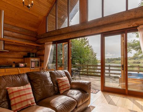 Lounge in Alder Lodge at The Tranquil Otter in Thurstonfield, Cumbria