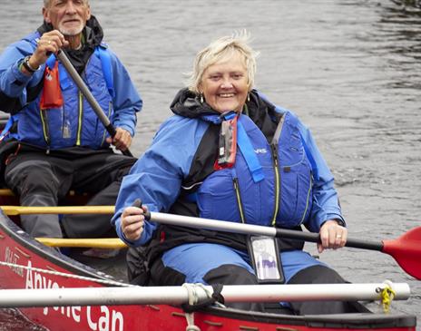 Visitors Canoeing with Anyone Can in the Lake District, Cumbria