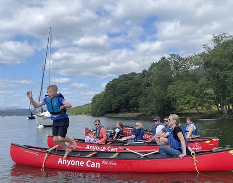 Visitors Canoeing with Anyone Can in the Lake District, Cumbria