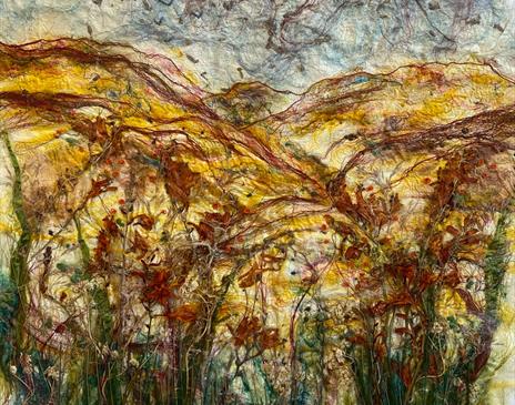 Textile artwork by Wendy Ann Stanger featuring layered natural fibres and dried flower inclusions